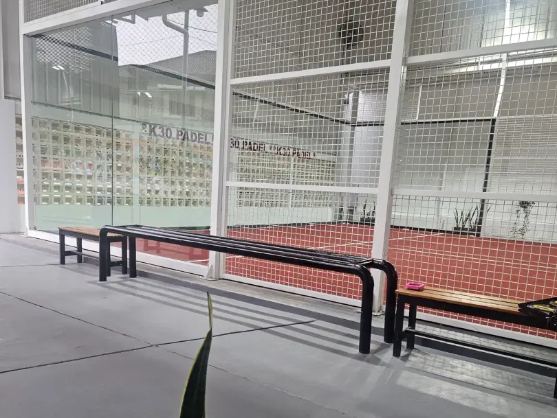 Benches along the court's glass wall