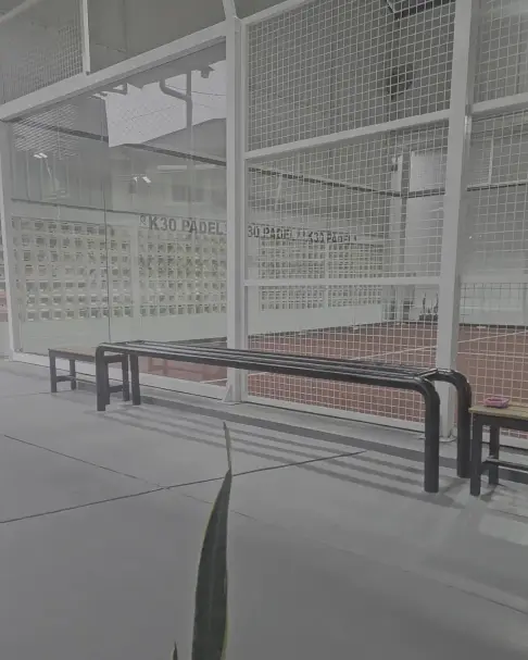 Bench and glass on the sideline